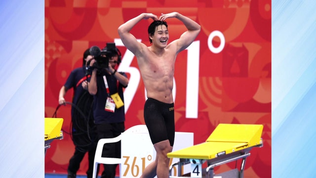 김영범, 남자 자유형 50m 금메달...한국 수영 첫 금